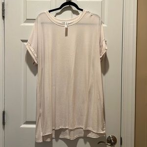 Cream colored long T-shirt top